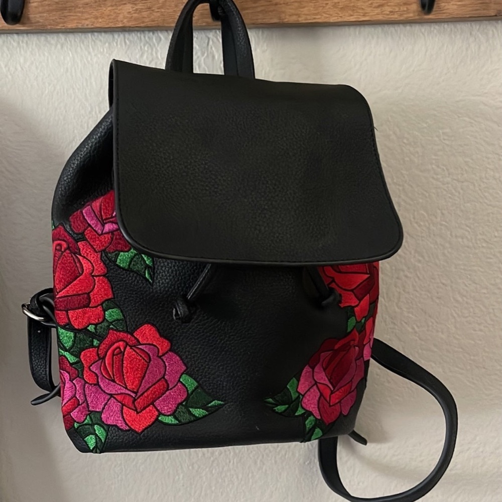 Rose embroidered black backpack